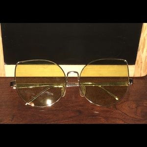 Green tinted fashion statement sunglasses